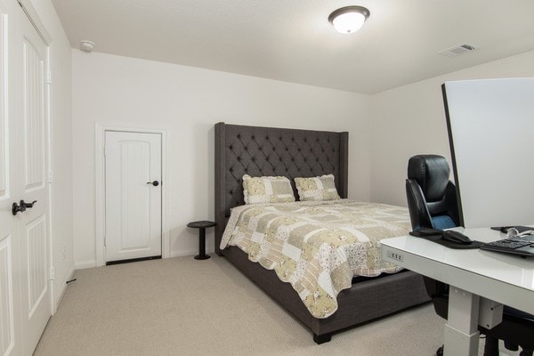 11211 Stirton, Tomball, TX 77375 - carpeted bedroom featuring a desk