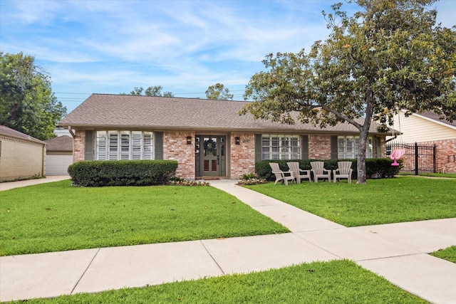 2910 Ann Arbor Dr, Houston, TX 77063 - ranch-style house featuring brick siding and a shingled roof