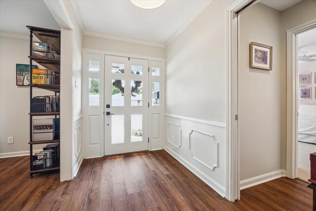 2910 Ann Arbor Dr, Houston, TX 77063 - foyer entrance with dark wood-style floors and crown molding