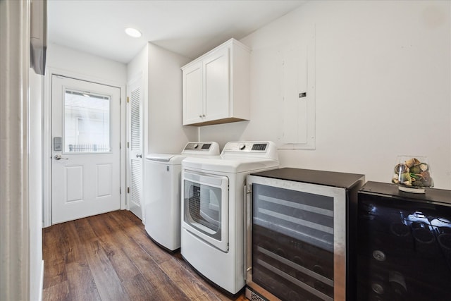 2910 Ann Arbor Dr, Houston, TX 77063 - washroom featuring wine cooler, cabinet space, dark wood-type flooring, independent washer and dryer, and electric panel