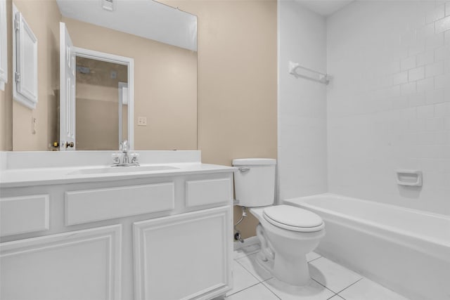 5514 Clarkston Ln, Spring, TX 77379 - full bathroom with toilet, vanity, tile patterned flooring, and tub / shower combination