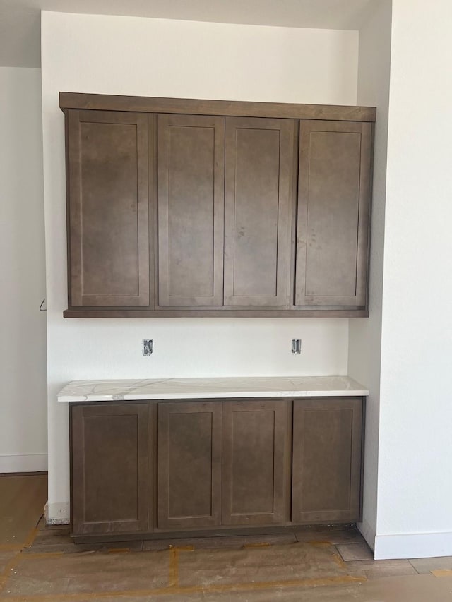 2250 Garden Arbor, Tomball, TX 77375 - bar area featuring baseboards and light wood-style floors
