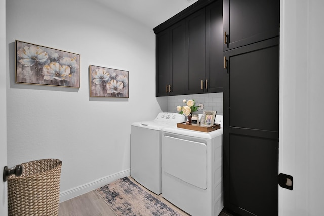 4792 W Fork Blvd, Conroe, TX 77304 - laundry room with cabinet space, washer and dryer, and baseboards