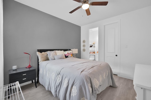 4792 W Fork Blvd, Conroe, TX 77304 - bedroom featuring light wood-style flooring, ensuite bathroom, ceiling fan, and baseboards
