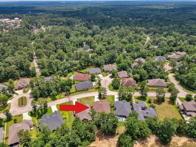 4792 W Fork Blvd, Conroe, TX 77304 - aerial view of property's location featuring a forest and nearby suburban area