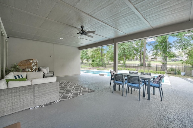 4792 W Fork Blvd, Conroe, TX 77304 - fenced backyard with an outdoor hangout area, a patio area, a ceiling fan, and outdoor dining area