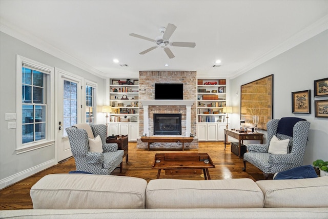 6225 Piping Rock Ln, Houston, TX 77057 - living area with ceiling fan, crown molding, wood finished floors, baseboards, and built in features