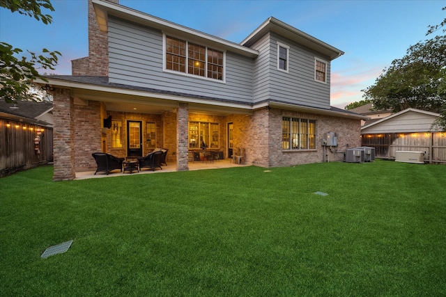 6225 Piping Rock Ln, Houston, TX 77057 - rear view of property with central AC, a patio, and brick siding