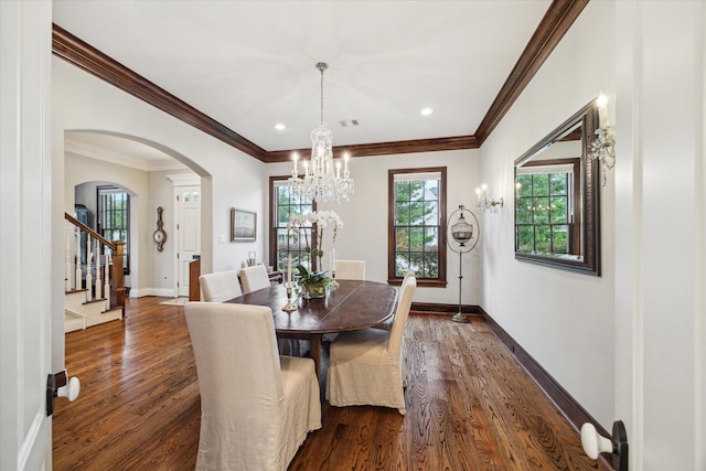 6225 Piping Rock Ln, Houston, TX 77057 - dining area featuring a chandelier, arched walkways, stairway, dark wood finished floors, and baseboards