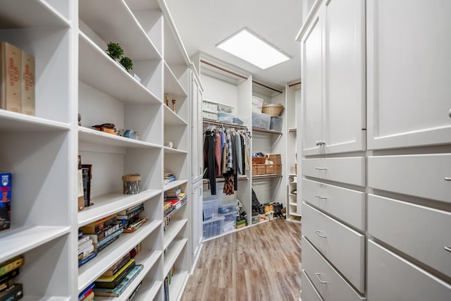 11 Bracebridge Dr, The Woodlands, TX 77382 - walk in closet with light wood finished floors