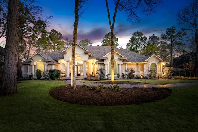 11 Bracebridge Dr, The Woodlands, TX 77382 - view of front of property with a lawn and a shingled roof