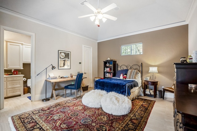 11 Bracebridge Dr, The Woodlands, TX 77382 - bedroom with an office area, crown molding, vaulted ceiling, and connected bathroom