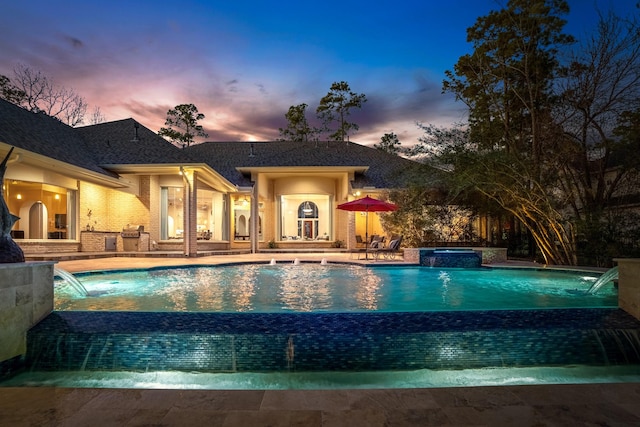 11 Bracebridge Dr, The Woodlands, TX 77382 - view of swimming pool with a patio area and a pool with connected hot tub