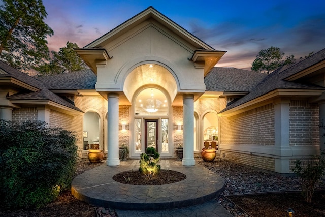 11 Bracebridge Dr, The Woodlands, TX 77382 - entrance to property with brick siding and roof with shingles