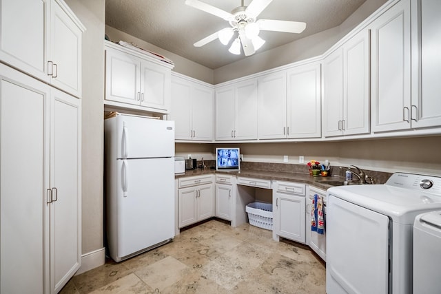11 Bracebridge Dr, The Woodlands, TX 77382 - washroom featuring a sink, independent washer and dryer, and ceiling fan