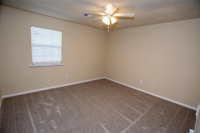 17647 Seven Pines Dr, Spring, TX 77379 - spare room featuring carpet, a ceiling fan, a textured ceiling, and baseboards