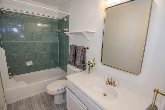 17647 Seven Pines Dr, Spring, TX 77379 - bathroom with toilet, vanity, shower / tub combination, and wood finished floors
