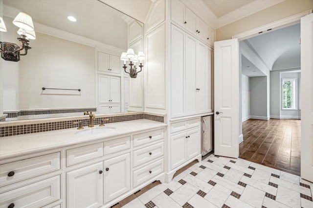 3423 Ella Lee Ln, Houston, TX 77027 - bathroom featuring vanity, crown molding, recessed lighting, and wood finished floors