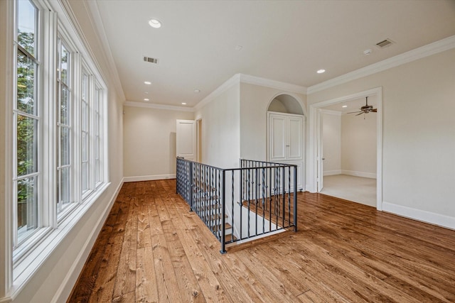 3423 Ella Lee Ln, Houston, TX 77027 - hallway with an upstairs landing, wood-type flooring, baseboards, recessed lighting, and ornamental molding
