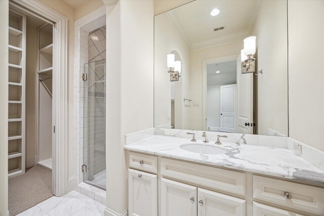 3423 Ella Lee Ln, Houston, TX 77027 - bathroom with a walk in closet, a stall shower, vanity, and crown molding