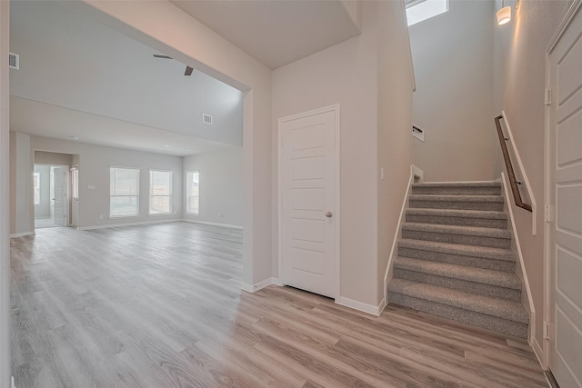 5819 Grantgrala Dr, Katy, TX 77493 - stairs with wood finished floors and baseboards