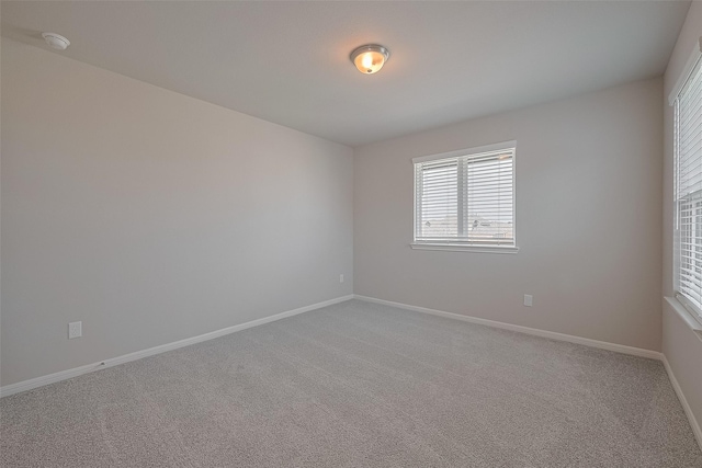 5819 Grantgrala Dr, Katy, TX 77493 - unfurnished room with carpet flooring, baseboards, and a smoke detector