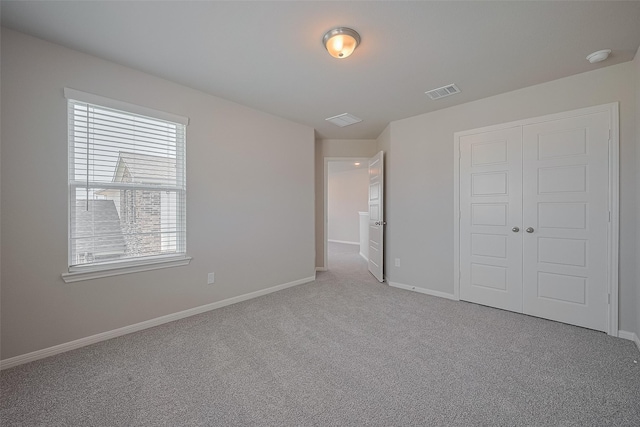 5819 Grantgrala Dr, Katy, TX 77493 - unfurnished bedroom with carpet, baseboards, and a closet