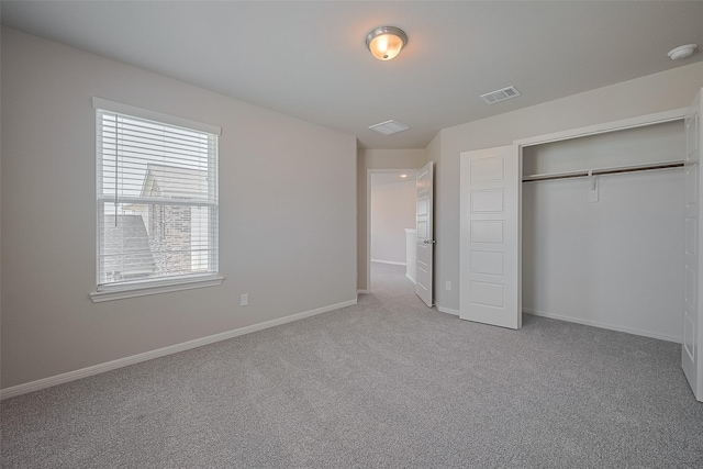 5819 Grantgrala Dr, Katy, TX 77493 - unfurnished bedroom featuring carpet, baseboards, and a closet