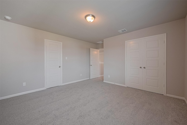 5819 Grantgrala Dr, Katy, TX 77493 - unfurnished bedroom featuring carpet, baseboards, and a closet