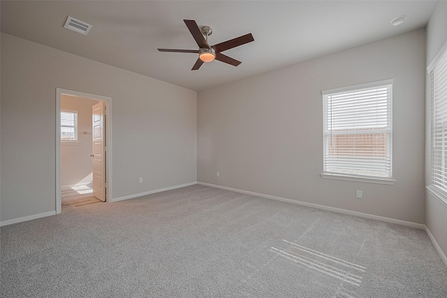 5819 Grantgrala Dr, Katy, TX 77493 - empty room with ceiling fan, light carpet, and baseboards