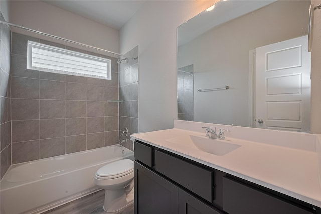 5819 Grantgrala Dr, Katy, TX 77493 - full bath featuring shower / tub combination, vanity, toilet, and wood finished floors