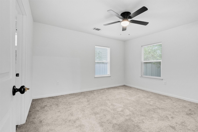 4002 Rutland St, Houston, TX 77018 - carpeted spare room with baseboards and a ceiling fan