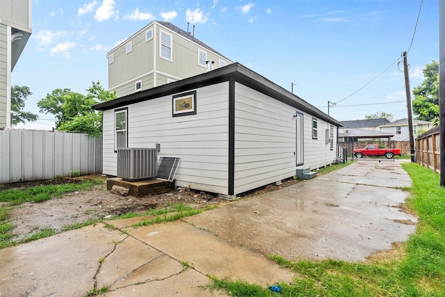 4002 Rutland St, Houston, TX 77018 - rear view of house with driveway and central air condition unit