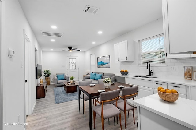 4002 Rutland St, Houston, TX 77018 - dining room with recessed lighting, light wood-type flooring, and a ceiling fan