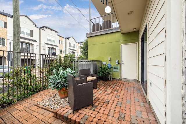 4502 Maxie St Unit A, Houston, TX 77007 - view of patio / terrace with a balcony and a residential view