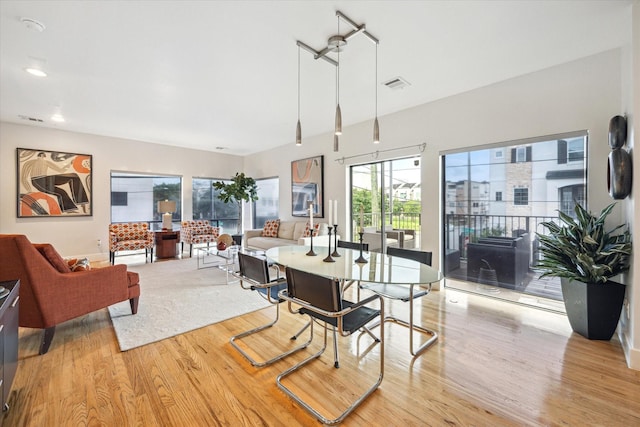 4502 Maxie St Unit A, Houston, TX 77007 - dining room featuring wood finished floors and recessed lighting