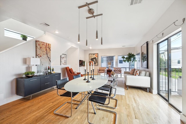 4502 Maxie St Unit A, Houston, TX 77007 - dining room with light wood finished floors and recessed lighting