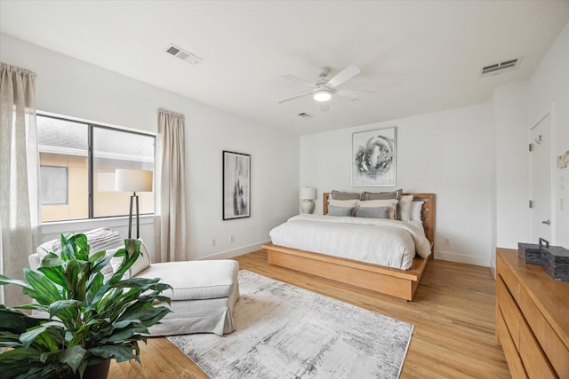 4502 Maxie St Unit A, Houston, TX 77007 - bedroom featuring light wood-type flooring, baseboards, and ceiling fan
