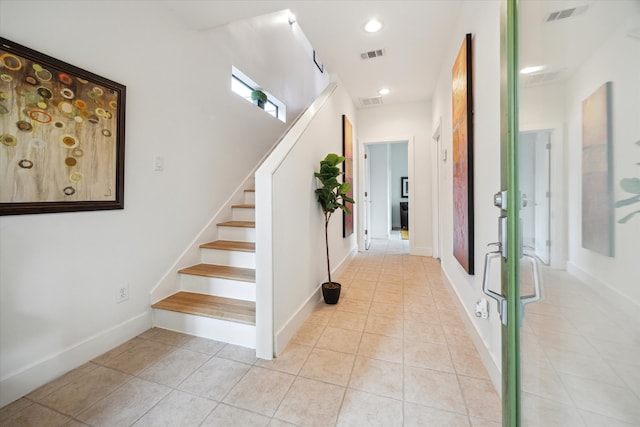 4502 Maxie St Unit A, Houston, TX 77007 - stairs with tile patterned flooring, recessed lighting, and baseboards