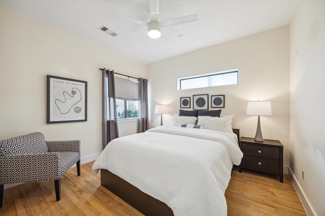 4502 Maxie St Unit A, Houston, TX 77007 - bedroom featuring light wood finished floors, ceiling fan, and baseboards