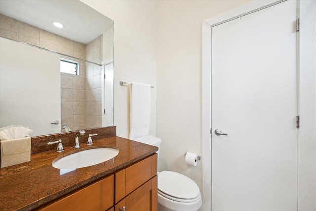 4502 Maxie St Unit A, Houston, TX 77007 - bathroom with toilet, vanity, and a tile shower