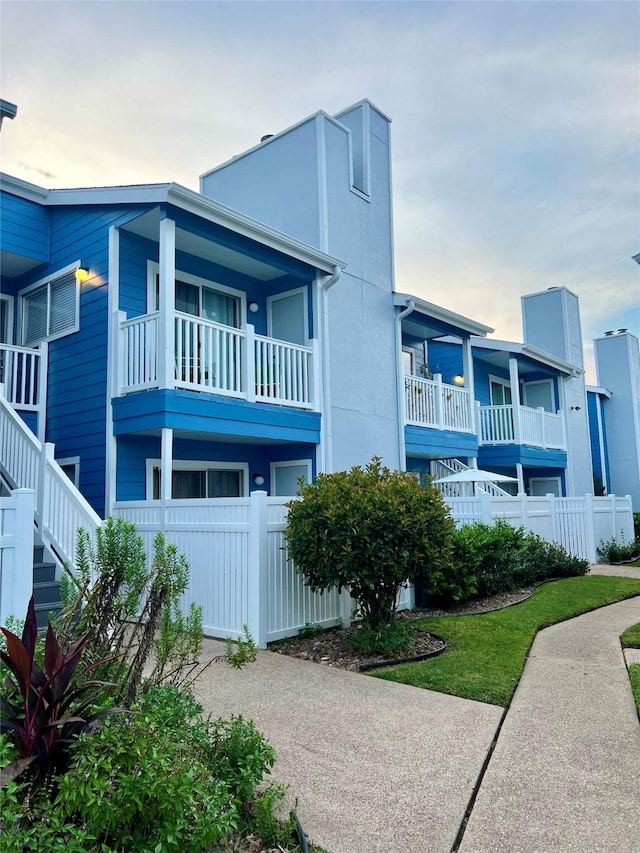 3506 Cove View Blvd Unit 506, Galveston, TX 77554 - view of front facade with gravel driveway