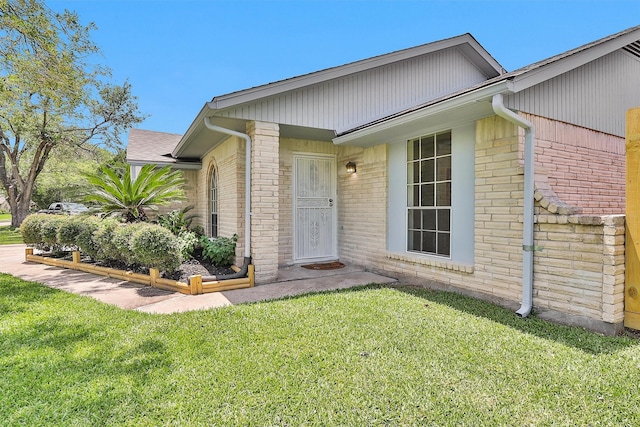 7322 Sawmill Trl, Houston, TX 77040 - entrance to property featuring brick siding and a lawn