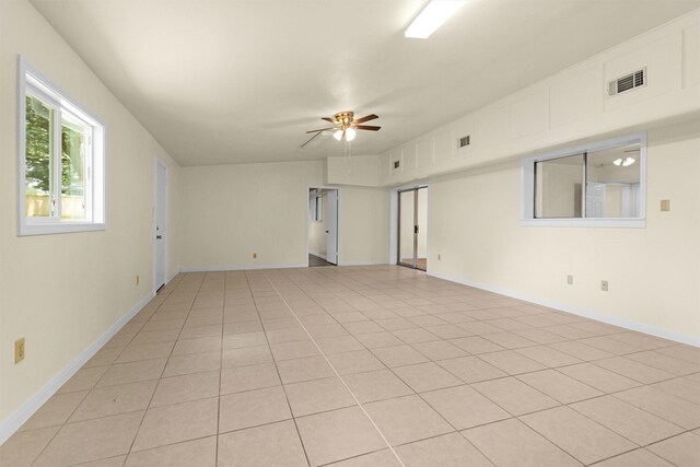 7322 Sawmill Trl, Houston, TX 77040 - empty room featuring a ceiling fan, baseboards, and light tile patterned floors