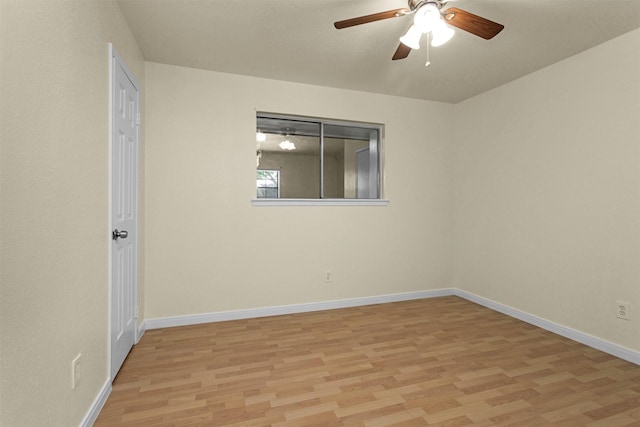 7322 Sawmill Trl, Houston, TX 77040 - spare room featuring light wood finished floors, a ceiling fan, and baseboards