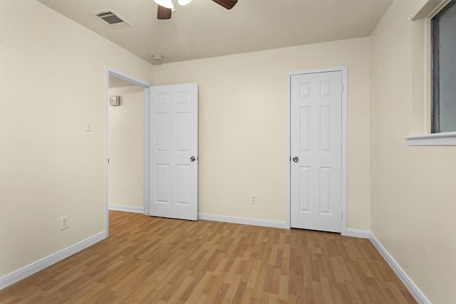 7322 Sawmill Trl, Houston, TX 77040 - unfurnished bedroom featuring light wood-style floors, baseboards, and ceiling fan