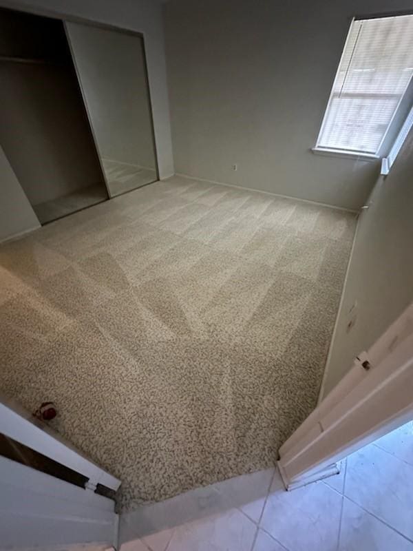 11207 Windmark Pl, Houston, TX 77099 - unfurnished bedroom with a closet and carpet