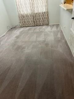 11207 Windmark Pl, Houston, TX 77099 - unfurnished dining area with carpet floors and baseboards