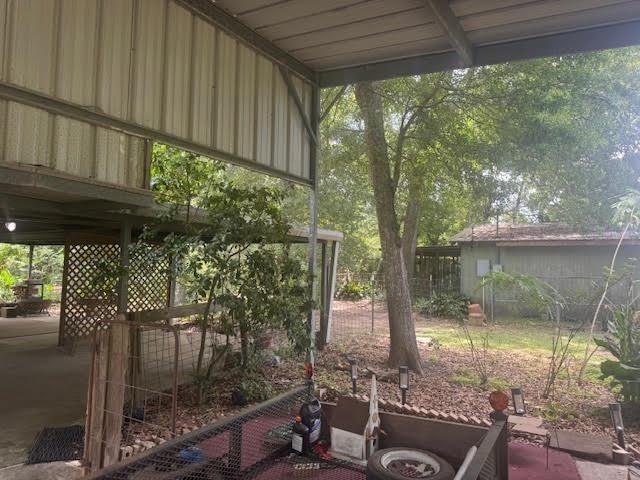3475 Pelican St, Pinehurst, TX 77630 - view of yard