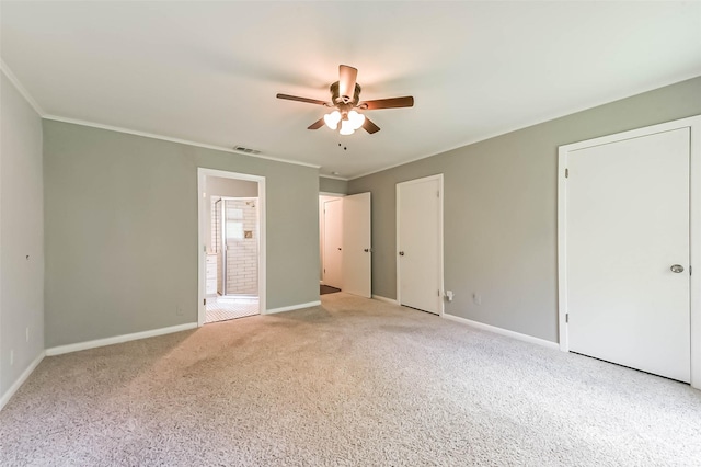 9207 Timberside Dr, Houston, TX 77025 - unfurnished bedroom featuring light carpet, baseboards, crown molding, and ensuite bath